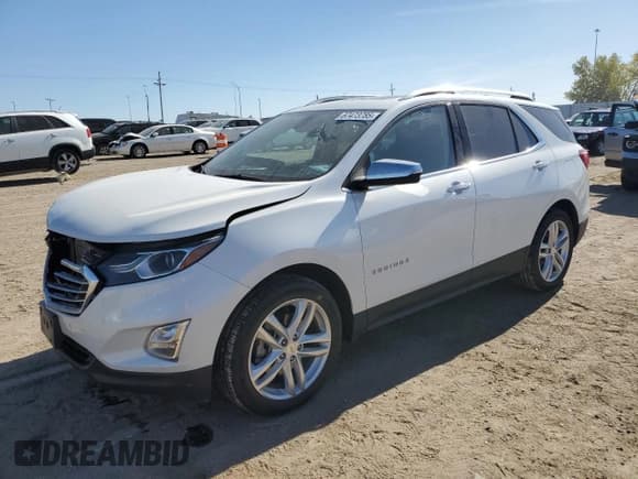 ✅ 2018 Chevrolet Equinox Premier • VIN: 2GNAXWEXXJ6348591 • Лот: 87473785. Опубликован ранее на Copart с пробегом 74 567 миль. Бесплатный доступ к архиву аукционных продаж из США и подробный отчёт об истории автомобиля на DreamBid. Изображение 1.