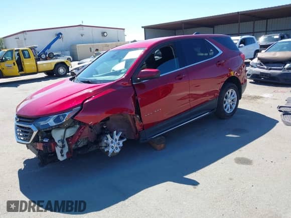 2020 Chevrolet Equinox LT with VIN 3GNAXKEV4LS604090, listed as a IAAI auction lot 43357539 with 60,219 mi miles and . Bid and sale history available at DreamBid. Image 2.