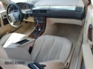 ✅ 1992 Mercedes-Benz 500 • VIN: WDBFA66E5NF054023 • Лот: 51841895. Опубликован ранее на Copart с пробегом 25 505 миль. Бесплатный доступ к архиву аукционных продаж из США и подробный отчёт об истории автомобиля на DreamBid. Изображение 8.