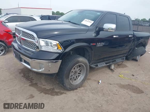 ✅ 2015 Ram 1500 Laramie • VIN: 1C6RR7NM9FS562856 • Lot: 42647026. Listed on IAAI with 172,523 mi. Free auction sales archive from the USA and detailed vehicle history report at DreamBid. Image 17.