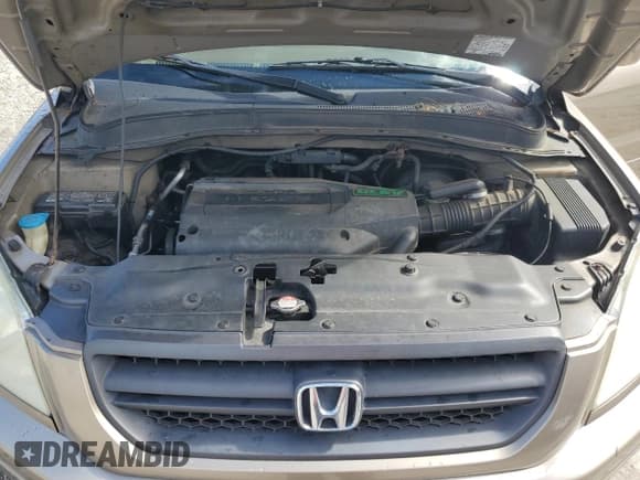 ✅ 2004 Honda Pilot EX • VIN: 2HKYF18464H501868 • Lot: 84239375. Listed on Copart with 250,979 mi. Free auction sales archive from the USA and detailed vehicle history report at DreamBid. Image 12.