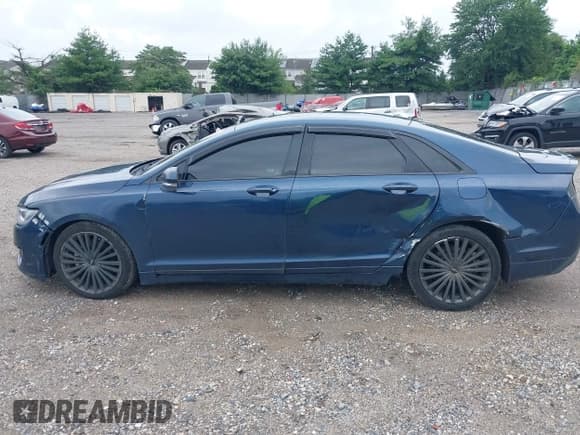 ✅ 2017 Lincoln MKZ Reserve • VIN: 3LN6L5F93HR644894 • Lot: 42634405. Wystawiony na IAAI z przebiegiem 127 139 mil. Bezpłatny archiwum sprzedaży aukcyjnych z USA i szczegółowy raport historii pojazdu na DreamBid. Zdjęcie 14.