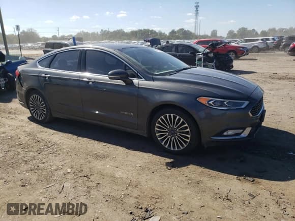 ✅ 2017 Ford Fusion Hybrid Titanium • VIN: 3FA6P0RU3HR304890 • Lot: 84184885. Wystawiony na Copart z przebiegiem 154 799 mil. Bezpłatny archiwum sprzedaży aukcyjnych z USA i szczegółowy raport historii pojazdu na DreamBid. Zdjęcie 4.