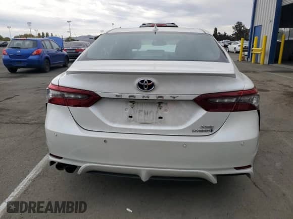 2021 Toyota Camry Hybrid XSE with VIN 4T1K31AK6MU561819, listed as a Copart auction lot 82128815 with 82,712 mi miles and Salvage title. Bid and sale history available at DreamBid. Image 6.