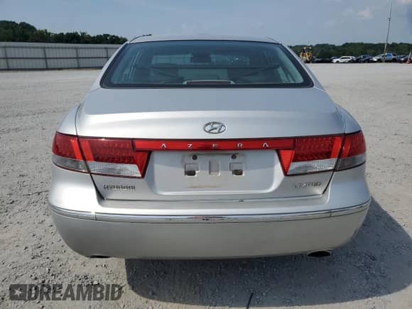 2006 Hyundai Azera SE с VIN KMHFC46F66A133655, выставлен на аукционе Copart как лот 62291215 с пробегом 122 998 миль миль и Списание • Salvage title. История ставок и продаж доступна на DreamBid. Изображение 6.