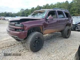2003 Chevrolet Tahoe Z71 with VIN 1GNEK13Z23R303725, listed as a Copart auction lot 83854395 with Not provided miles and Salvage title. Bid and sale history available at DreamBid. Image 1.
