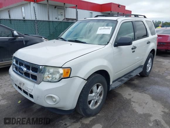 ✅ 2009 Ford Escape XLT • VIN: 1FMCU03769KC57512 • Lot: 43399599. Listed on IAAI with 198,628 mi. Free auction sales archive from the USA and detailed vehicle history report at DreamBid. Image 17.