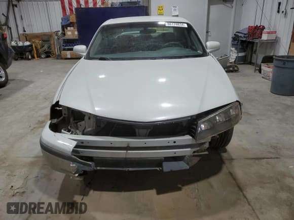 ✅ 2004 Chevrolet Impala • VIN: 2G1WF52EX49221785 • Lot: 86170834. Wystawiony na Copart z przebiegiem 186 785 mil. Bezpłatny archiwum sprzedaży aukcyjnych z USA i szczegółowy raport historii pojazdu na DreamBid. Zdjęcie 5.