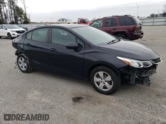 ✅ 2018 Chevrolet Cruze LS • VIN: 1G1BC5SM6J7229197 • Lot: 37018753. Listed on Copart with 79,601 mi. Free auction sales archive from the USA and detailed vehicle history report at DreamBid. Image 4.