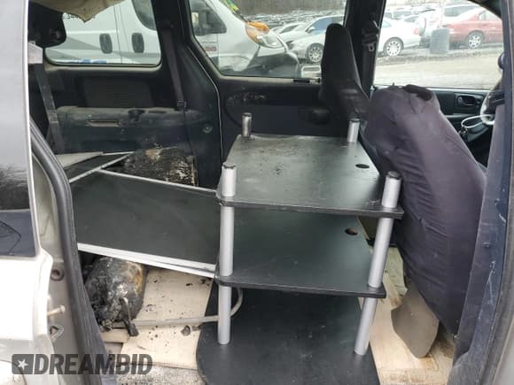 ✅ 2001 Chrysler Voyager LX • VIN: 1C4GJ45341B258517 • Лот: 47789295. Опубликован ранее на Copart с пробегом Не указан. Бесплатный доступ к архиву аукционных продаж из США и подробный отчёт об истории автомобиля на DreamBid. Изображение 11.