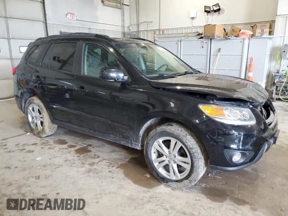 ✅ 2012 Hyundai Santa Fe SE • VIN: 5XYZHDAG8CG128326 • Lot: 67589184. Listed on Copart with 155,709 mi. Free auction sales archive from the USA and detailed vehicle history report at DreamBid. Image 4.
