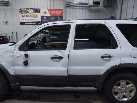 ✅ 2006 Ford Escape XLT • VIN: 1FMCU93156KC93719 • Lot: 41995488. Listed on IAAI with 218,213 mi. Free auction sales archive from the USA and detailed vehicle history report at DreamBid. Image 15.