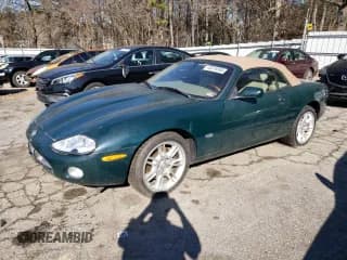 ✅ 2001 Jaguar XK • VIN: SAJDA42CX1NA22450 • Лот: 43019265. Опубликован ранее на Copart с пробегом 109 090 миль. Бесплатный доступ к архиву аукционных продаж из США и подробный отчёт об истории автомобиля на DreamBid. Изображение 1.