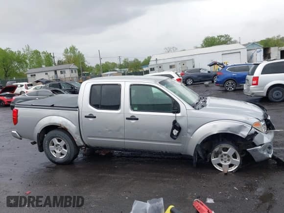 ✅ 2006 Nissan Frontier SE • VIN: 1N6AD07W56C434356 • Lot: 42199530. Listed on IAAI with 224,148 mi. Free auction sales archive from the USA and detailed vehicle history report at DreamBid. Image 13.
