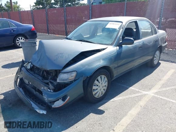 ✅ 1996 Toyota Corolla • VIN: 1NXBA02E0TZ445846 • Lot: 42303514. Listed on IAAI with 155,812 mi. Free auction sales archive from the USA and detailed vehicle history report at DreamBid. Image 2.