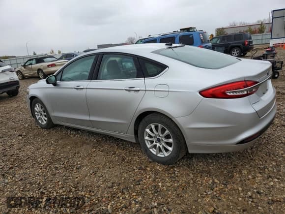✅ 2018 Ford Fusion S • VIN: 3FA6P0G76JR165261 • Лот: 90377715. Опубликован ранее на Copart с пробегом 87 901 миль. Бесплатный доступ к архиву аукционных продаж из США и подробный отчёт об истории автомобиля на DreamBid. Изображение 2.