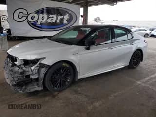 2021 Toyota Camry Hybrid XSE с VIN 4T1K31AK5MU024181, выставлен на аукционе Copart как лот 66341055 с пробегом 52 543 миль миль и Списание • Salvage title. История ставок и продаж доступна на DreamBid. Изображение 1.