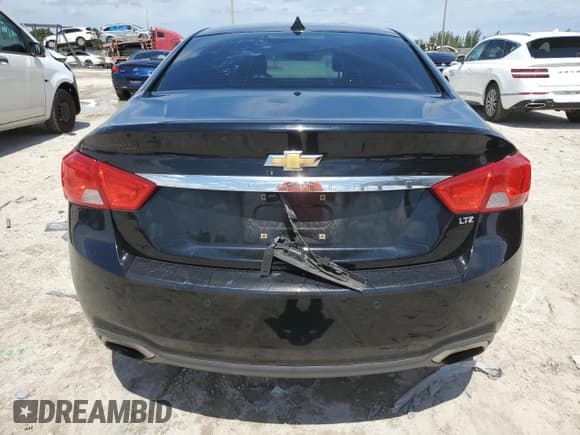 ✅ 2014 Chevrolet Impala LTZ • VIN: 2G1145SL1E9116939 • Лот: 71545434. Опубликован ранее на Copart с пробегом 141 993 миль. Бесплатный доступ к архиву аукционных продаж из США и подробный отчёт об истории автомобиля на DreamBid. Изображение 6.