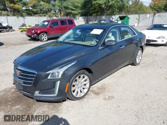 ✅ 2015 Cadillac CTS Luxury AWD • VIN: 1G6AX5S33F0108385 • Lot: 43478755. Listed on IAAI with 51,514 mi. Free auction sales archive from the USA and detailed vehicle history report at DreamBid. Image 2.