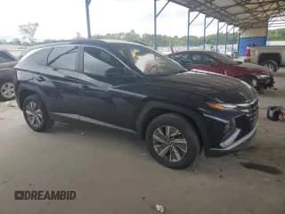 ✅ 2022 Hyundai Tucson Blue • VIN: KM8JBCA14NU018875 • Лот: 67028315. Опубликован ранее на Copart с пробегом 273 692 миль. Бесплатный доступ к архиву аукционных продаж из США и подробный отчёт об истории автомобиля на DreamBid. Изображение 4.