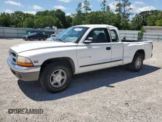 1999 Dodge Dakota SLT с VIN 1B7GL22X2XS114639, выставлен на аукционе Copart как лот 61749075 с пробегом 135 191 миль миль и Списание • Salvage title. История ставок и продаж доступна на DreamBid. Изображение 1.