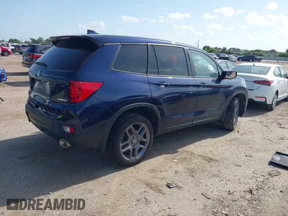 ✅ 2023 Honda Passport EX-L • VIN: 5FNYF8H59PB018864 • Lot: 42745399. Listed on IAAI with 77,035 mi. Free auction sales archive from the USA and detailed vehicle history report at DreamBid. Image 4.