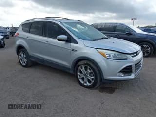 ✅ 2014 Ford Escape Titanium • VIN: 1FMCU0J96EUD08641 • Lot: 43717015. Wystawiony na IAAI z przebiegiem 193 784 mil. Bezpłatny archiwum sprzedaży aukcyjnych z USA i szczegółowy raport historii pojazdu na DreamBid. Zdjęcie 1.