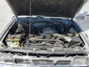 ✅ 1993 Nissan Frontier SE • VIN: 1N6HD16Y9PC430786 • Лот: 56333545. Опубликован ранее на Copart с пробегом 262 505 миль. Бесплатный доступ к архиву аукционных продаж из США и подробный отчёт об истории автомобиля на DreamBid. Изображение 11.