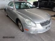 ✅ 2004 Lexus SC 430 • VIN: JTHFN48Y740051061 • Lot: 43307107. Listed on IAAI with 148,224 mi. Free auction sales archive from the USA and detailed vehicle history report at DreamBid. Image 1.