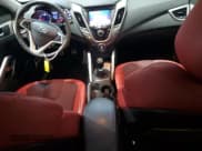 ✅ 2012 Hyundai Veloster w/Gray Int • VIN: KMHTC6AD5CU032380 • Lot: 83985464. Wystawiony na Copart z przebiegiem 107 715 mil. Bezpłatny archiwum sprzedaży aukcyjnych z USA i szczegółowy raport historii pojazdu na DreamBid. Zdjęcie 8.