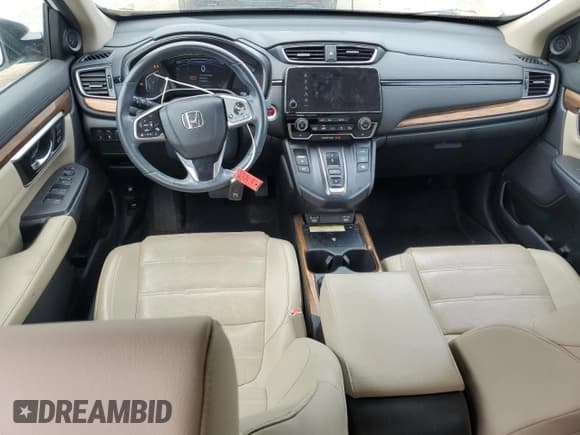 ✅ 2020 Honda CR-V Touring • VIN: 7FART6H9XLE020917 • Лот: 58069125. Опубликован ранее на Copart с пробегом 63 535 миль. Бесплатный доступ к архиву аукционных продаж из США и подробный отчёт об истории автомобиля на DreamBid. Изображение 8.