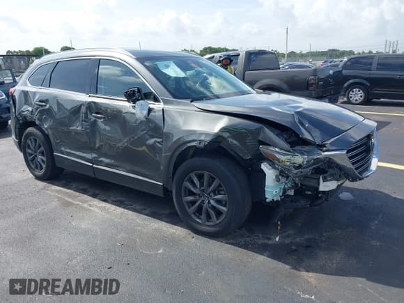 ✅ 2021 Mazda CX-9 Touring • VIN: JM3TCACY1M0503979 • Lot: 42650572. Wystawiony na IAAI z przebiegiem 28 673 mil. Bezpłatny archiwum sprzedaży aukcyjnych z USA i szczegółowy raport historii pojazdu na DreamBid. Zdjęcie 1.
