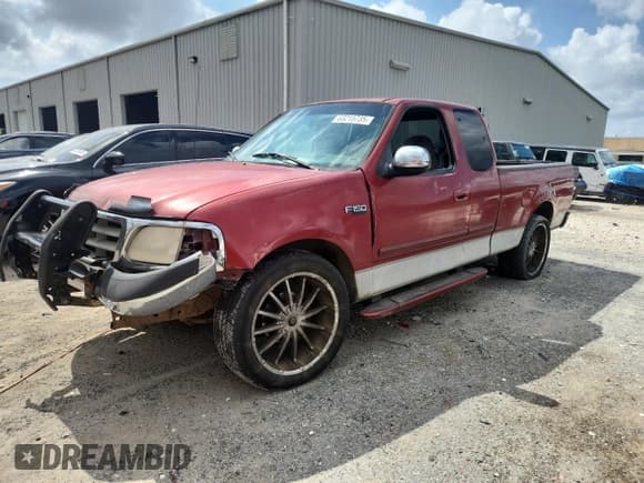 ✅ 2000 Ford F-150 XL • VIN: 1FTZX1721YNA09515 • Lot: 63215735. Listed on Copart with 188,149 mi. Free auction sales archive from the USA and detailed vehicle history report at DreamBid. Image 1.