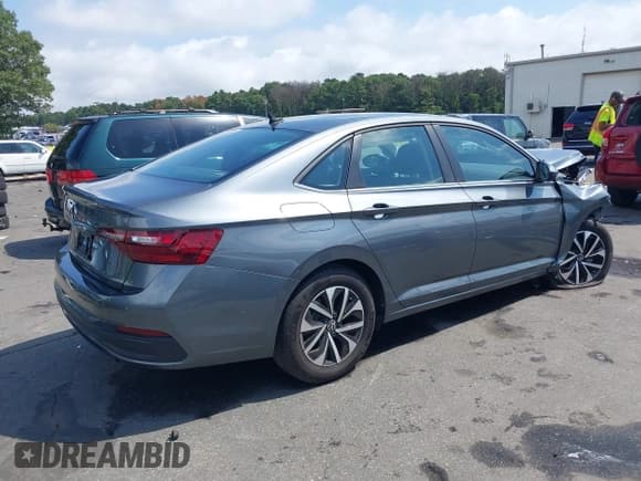 ✅ 2023 Volkswagen Jetta S • VIN: 3VW5M7BU3PM052553 • Lot: 43024368. Listed on IAAI with 20,062 mi. Free auction sales archive from the USA and detailed vehicle history report at DreamBid. Image 4.