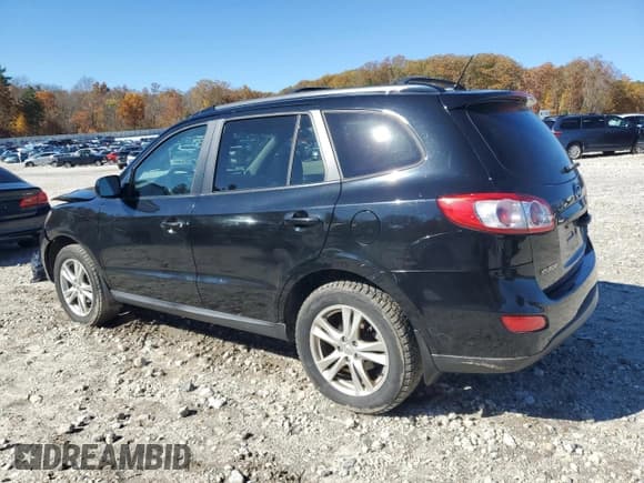 ✅ 2011 Hyundai Santa Fe SE • VIN: 5XYZHDAG5BG014279 • Lot: 87061945. Listed on Copart with 118,406 mi. Free auction sales archive from the USA and detailed vehicle history report at DreamBid. Image 2.