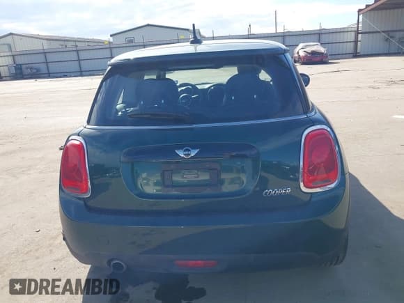 ✅ 2018 MINI Hardtop Cooper • VIN: WMWXP5C55J3C65351 • Lot: 41346510. Listed on IAAI with 61,964 mi. Free auction sales archive from the USA and detailed vehicle history report at DreamBid. Image 17.