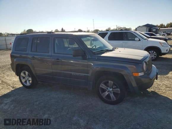 ✅ 2015 Jeep Patriot High Altitude • VIN: 1C4NJPFA7FD164231 • Lot: 84565725. Listed on Copart with 114,463 mi. Free auction sales archive from the USA and detailed vehicle history report at DreamBid. Image 4.