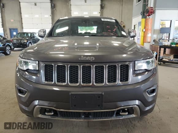 ✅ 2014 Jeep Grand Cherokee Overland • VIN: 1C4RJFCM8EC434713 • Lot: 68151405. Listed on Copart with 118,503 mi. Free auction sales archive from the USA and detailed vehicle history report at DreamBid. Image 5.