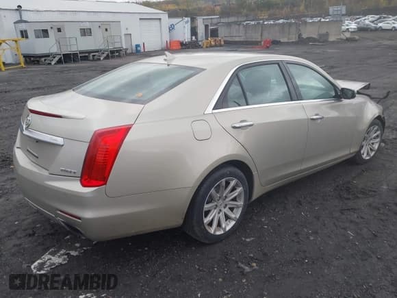 ✅ 2014 Cadillac CTS AWD • VIN: 1G6AW5SX4E0143103 • Лот: 43573229. Опубликован ранее на IAAI с пробегом 148 195 миль. Бесплатный доступ к архиву аукционных продаж из США и подробный отчёт об истории автомобиля на DreamBid. Изображение 4.