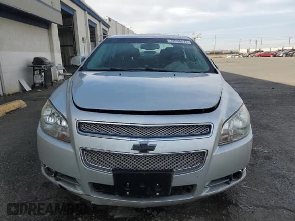 ✅ 2012 Chevrolet Malibu LTZ • VIN: 1G1ZG5E7XCF128343 • Lot: 74536074. Listed on Copart with 132,162 mi. Free auction sales archive from the USA and detailed vehicle history report at DreamBid. Image 5.