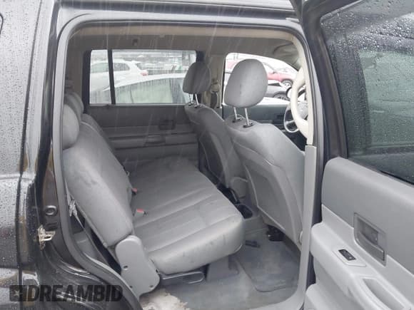 ✅ 2005 Dodge Durango SXT • VIN: 1D4HB38N35F554011 • Лот: 40873398. Опубликован ранее на IAAI с пробегом 170 538 миль. Бесплатный доступ к архиву аукционных продаж из США и подробный отчёт об истории автомобиля на DreamBid. Изображение 8.