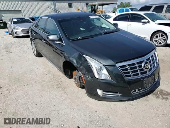 ✅ 2013 Cadillac XTS Luxury • VIN: 2G61R5S36D9152877 • Lot: 68540915. Listed on Copart with 86,531 mi. Free auction sales archive from the USA and detailed vehicle history report at DreamBid. Image 13.