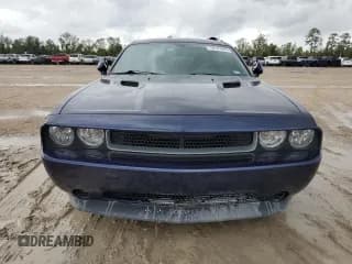 ✅ 2013 Dodge Challenger SXT • VIN: 2C3CDYAG7DH660084 • Lot: 79347964. Wystawiony na Copart z przebiegiem 97 067 mil. Bezpłatny archiwum sprzedaży aukcyjnych z USA i szczegółowy raport historii pojazdu na DreamBid. Zdjęcie 5.