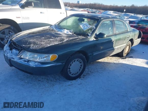 ✅ 1998 Lincoln Continental • VIN: 1LNFM97V4WY713283 • Lot: 41264918. Listed on IAAI with 89,134 mi. Free auction sales archive from the USA and detailed vehicle history report at DreamBid. Image 17.