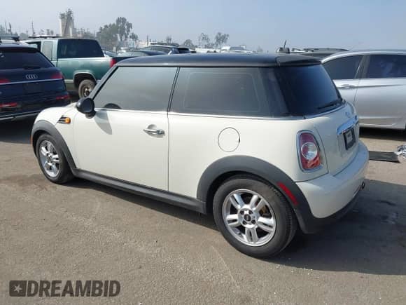2012 MINI Hardtop with VIN WMWSU3C51CT257108, listed as a IAAI auction lot 43577965 with 127,914 mi miles and . Bid and sale history available at DreamBid. Image 3.