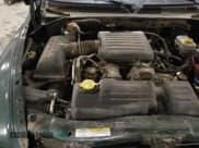 ✅ 2002 Dodge Dakota SLT • VIN: 1B7HG48N42S725145 • Lot: 82690584. Wystawiony na Copart z przebiegiem 159 161 mil. Bezpłatny archiwum sprzedaży aukcyjnych z USA i szczegółowy raport historii pojazdu na DreamBid. Zdjęcie 13.