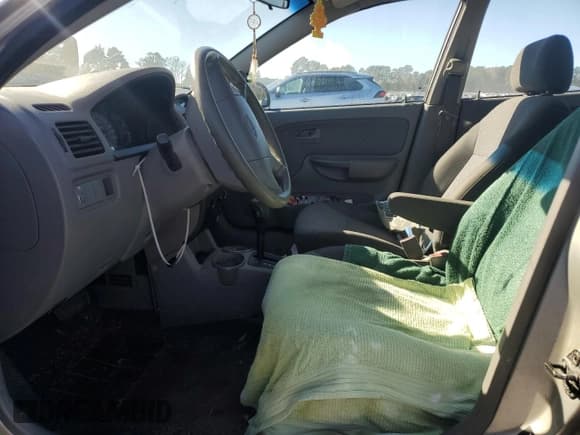 ✅ 2005 Kia Rio • VIN: KNADC125956382747 • Lot: 82539335. Listed on Copart with 166,122 mi. Free auction sales archive from the USA and detailed vehicle history report at DreamBid. Image 7.