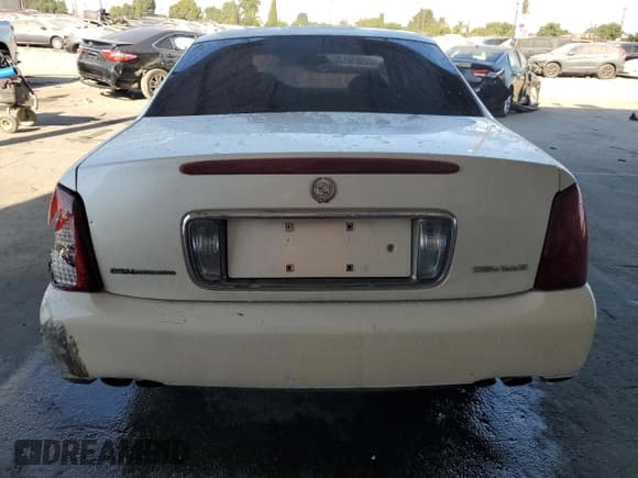 ✅ 2000 Cadillac DeVille • VIN: 1G6KD54Y2YU272566 • Lot: 70886454. Listed on Copart with 152,690 mi. Free auction sales archive from the USA and detailed vehicle history report at DreamBid. Image 6.