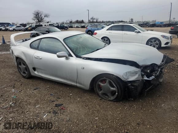 ✅ 1994 Toyota Supra • VIN: JZA800003832 • Lot: 47542995. Listed on Copart with 129,896 mi. Free auction sales archive from the USA and detailed vehicle history report at DreamBid. Image 4.