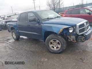 2006 Dodge Dakota SLT z VIN 1D7HW48J86S518687, wystawiony jako IAAI lot #41568866 z przebiegiem 198 124 mil mil oraz . Historia ofert i sprzedaży dostępna na DreamBid. Obrazek 1.